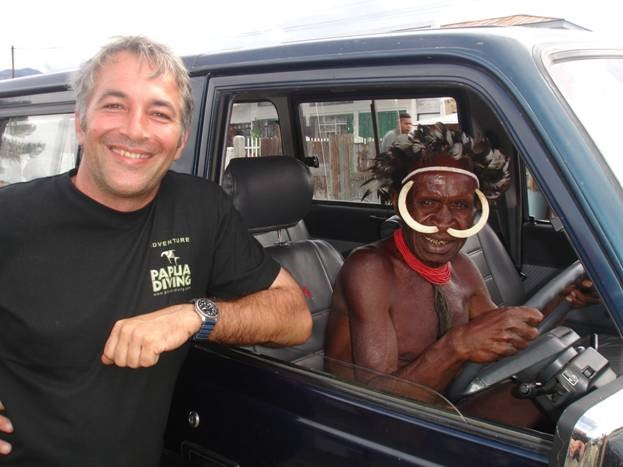 max ammer with one of the papuan villager