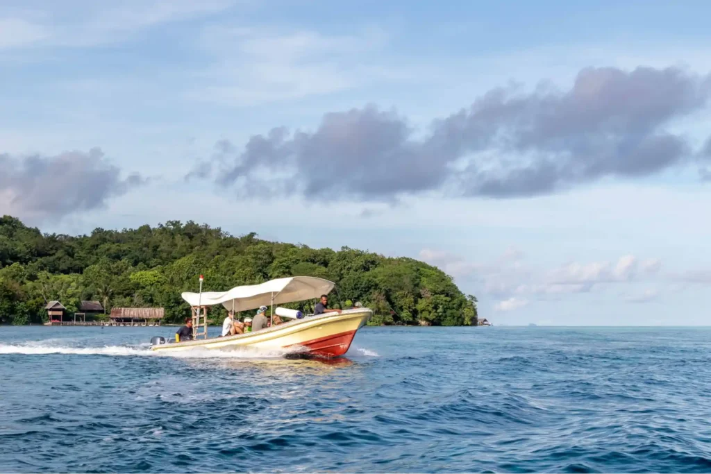 boat transfer at papua diving resorts for land-based activities